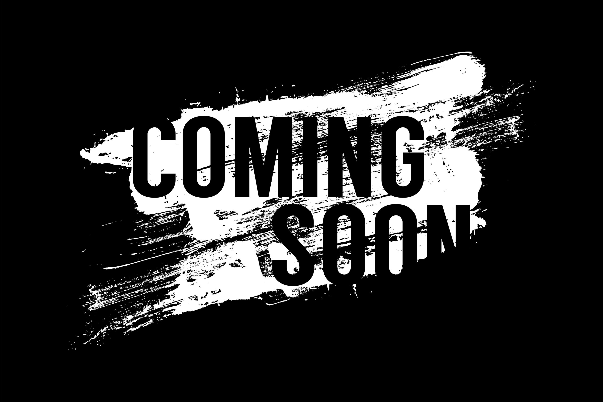 Coming soon text on grunge background